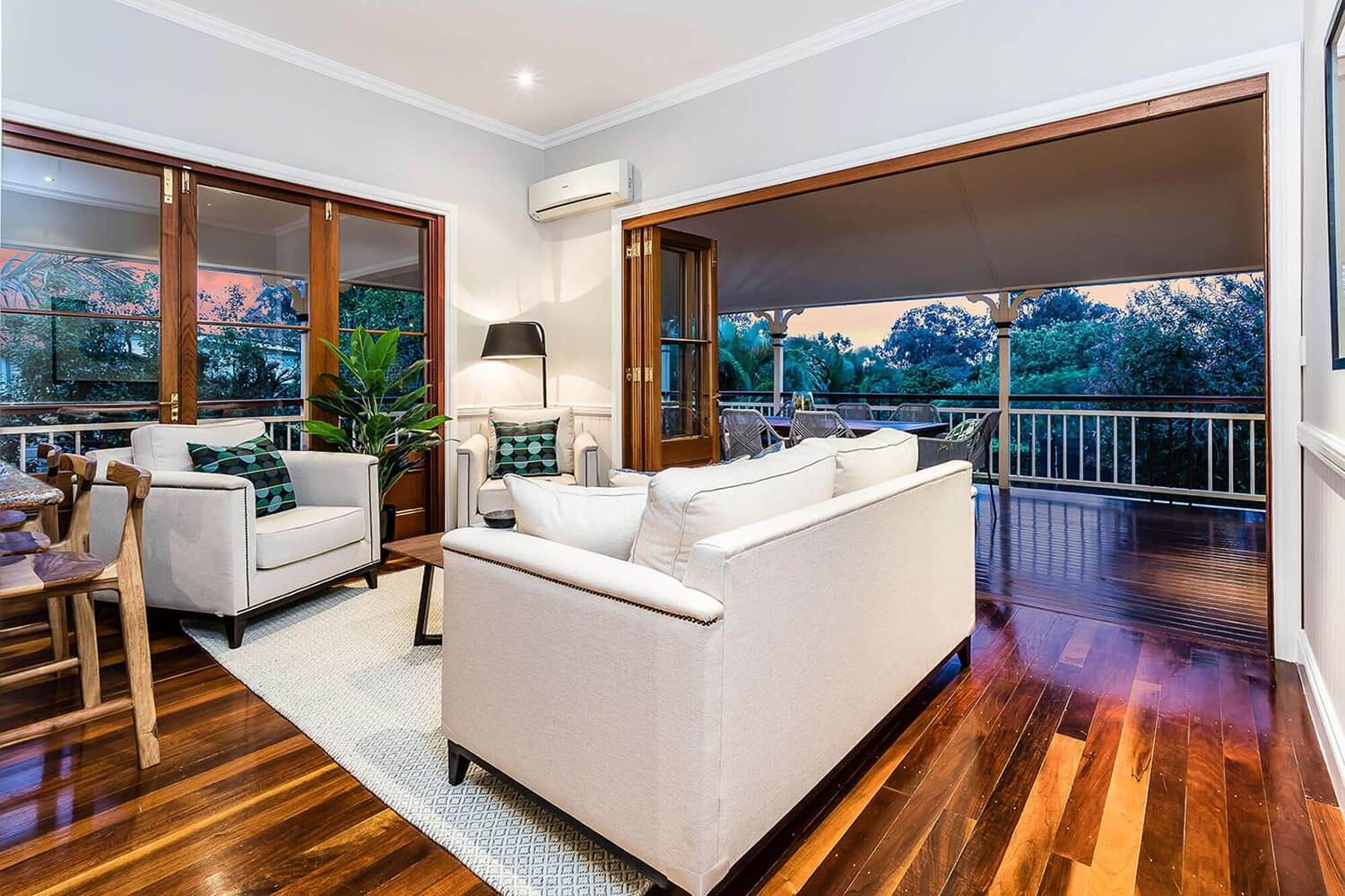 styled living area with timber floorboards